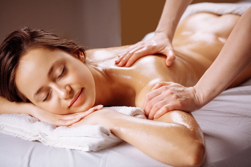 Massaging skin with avocado oil