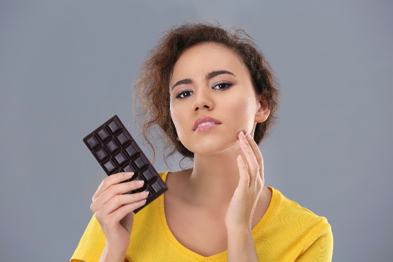 Different foods that may cause acne to appear.